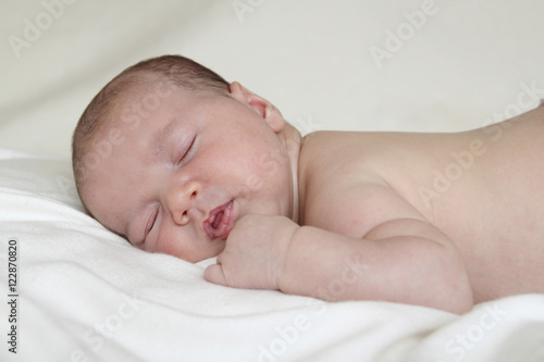 newborn sleeping relaxed