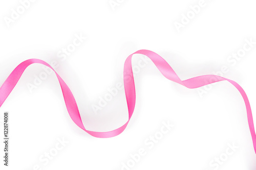 Pink satin ribbon isolated on white background. Top view. Flat lay.