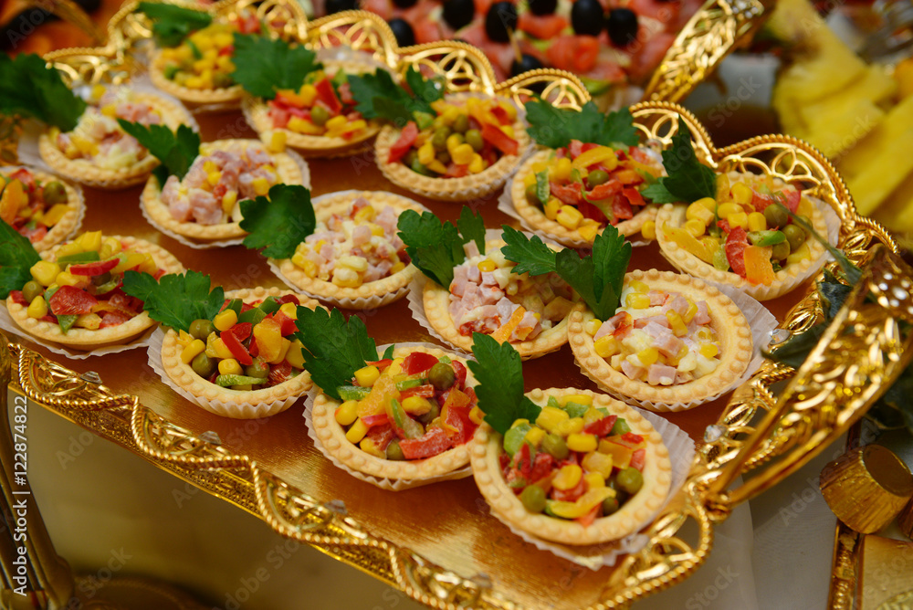 Fototapeta premium Olivier salad tartlets from appetizer table