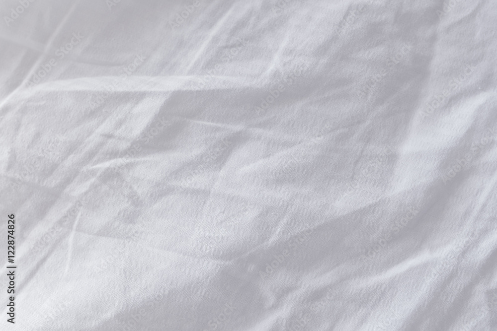 Crumpled bed sheets texture as background Crumpled bed sheets texture as background