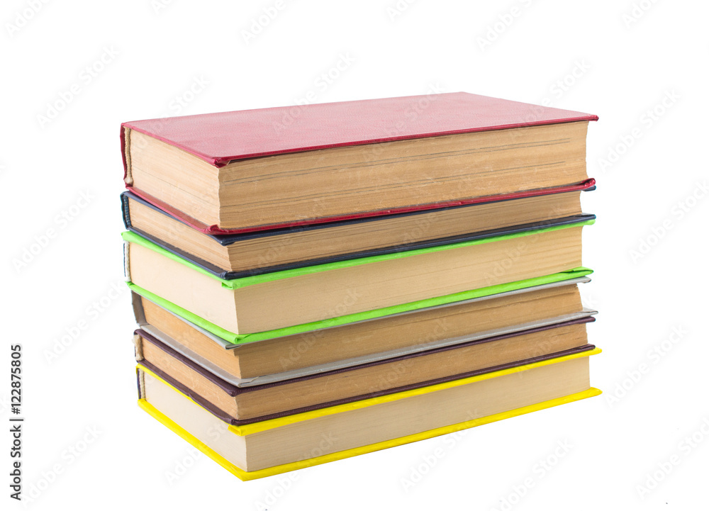 stack of multicolored books. on white, isolated background. stack of multicolored books. on white, isolated background.