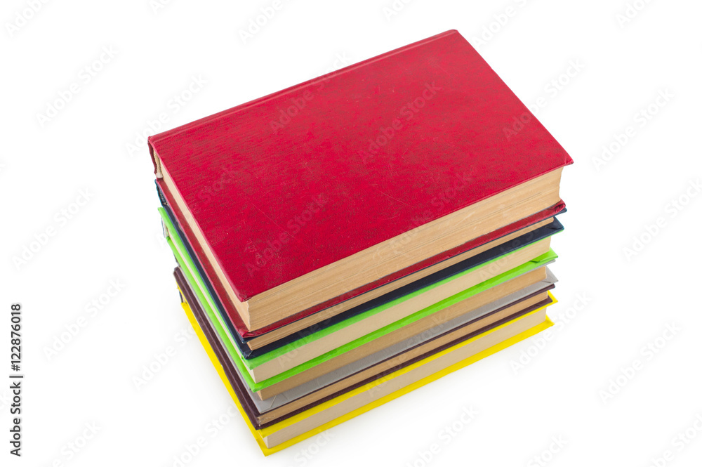 stack of multicolored books. on white, isolated background. stack of multicolored books. on white, isolated background.