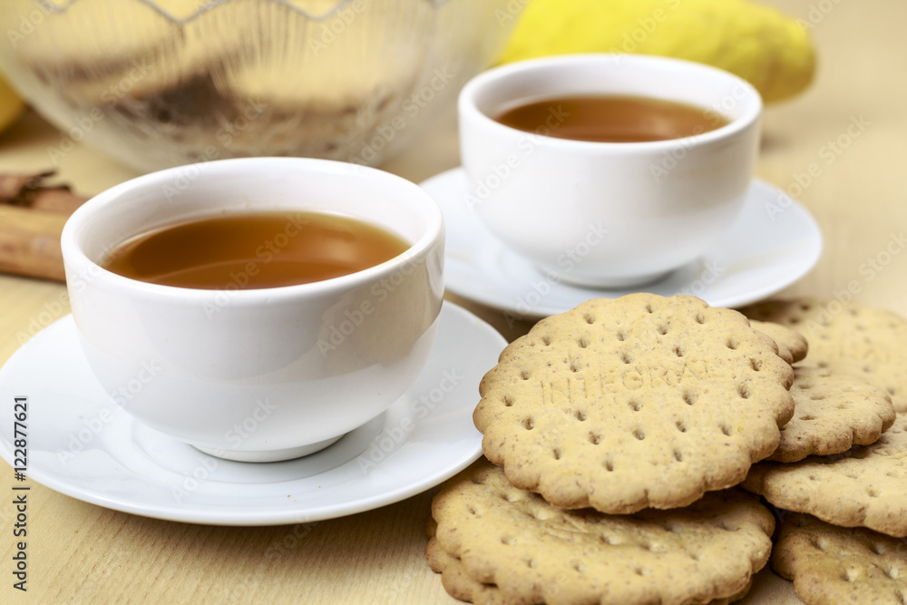 Losing weight: Healthy cookies and Pu-erh tea cups. The word Losing weight: Healthy cookies and Pu-erh tea cups. The word