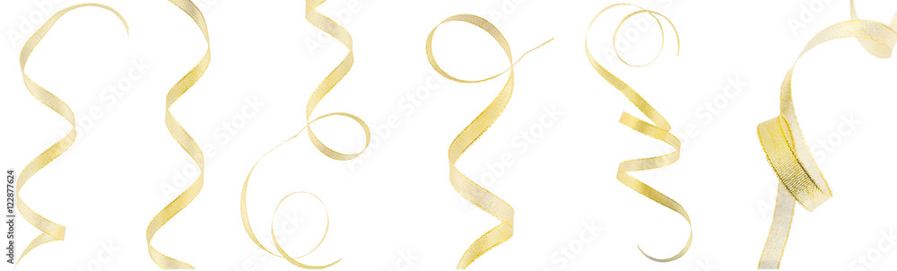Many gold ribbons on a white, isolated background. Top view. Fla Many gold ribbons on a white, isolated background. Top view. Fla