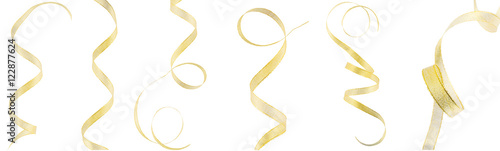 Many gold ribbons on a white, isolated background. Top view. Fla