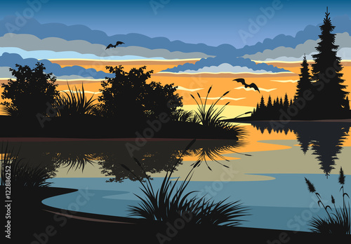 Landscape. Sunset on a lake.