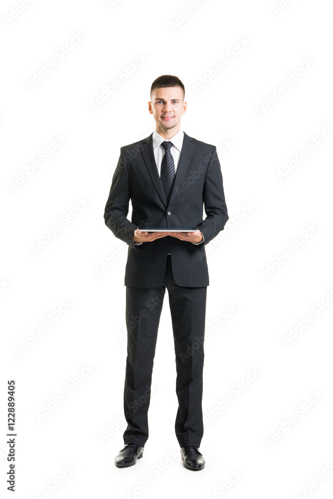 Young and confident business man holding a tablet Young and confident business man holding a tablet