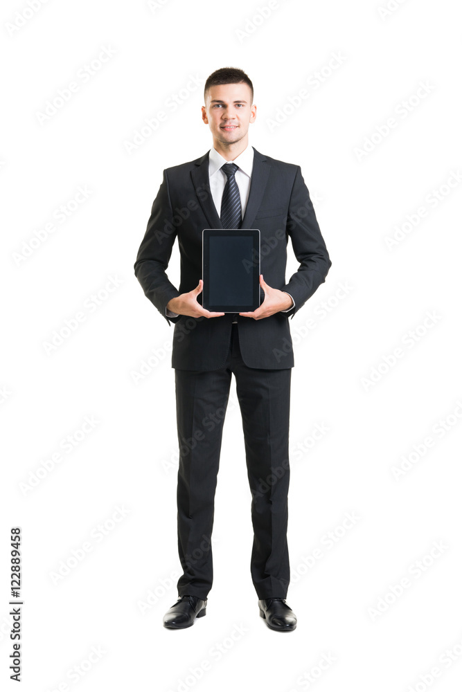 Young and confident business man holding a tablet Young and confident business man holding a tablet