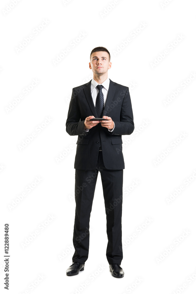Young and confident business man with a telephone Young and confident business man with a telephone