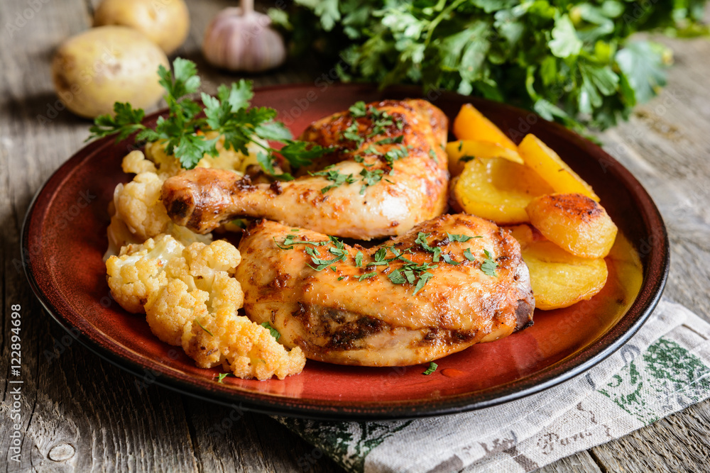 Roasted chicken legs with potato and cauliflower Roasted chicken legs with potato and cauliflower