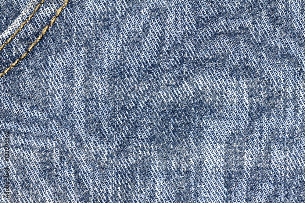 Denim jeans texture or denim jeans background with seam. Old grunge vintage denim jeans. Stitched texture denim jeans background of jeans fashion design. Denim jeans texture or denim jeans background with seam. Old grunge vintage denim jeans. Stitched texture denim jeans background of jeans fashion design.