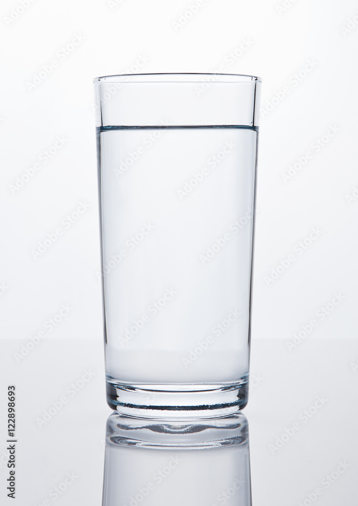 Glass of healthy still drinking water on white Glass of healthy still drinking water on white