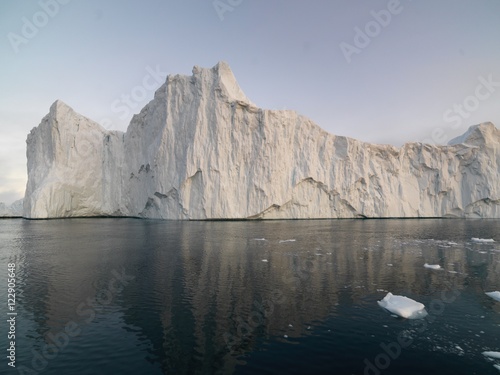 Big icebergs are ont he arctic ocean in Greenland