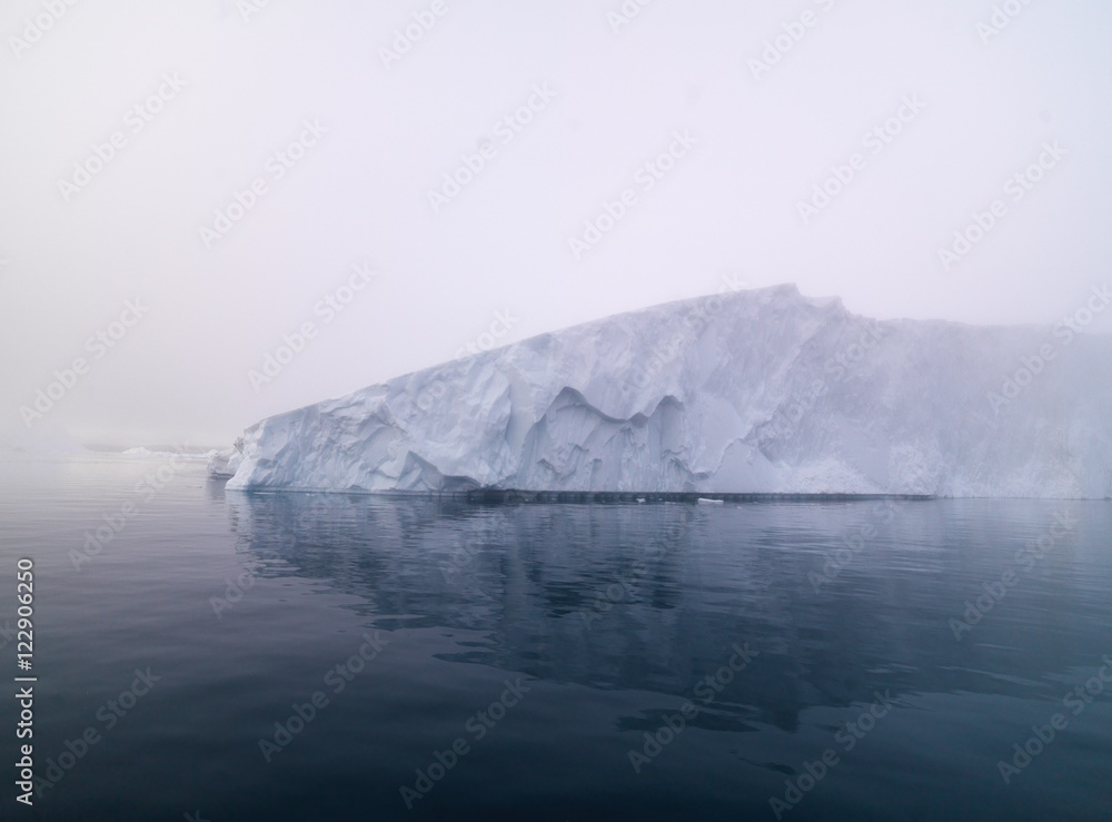 Obraz premium Big icebergs are ont he arctic ocean in Greenland