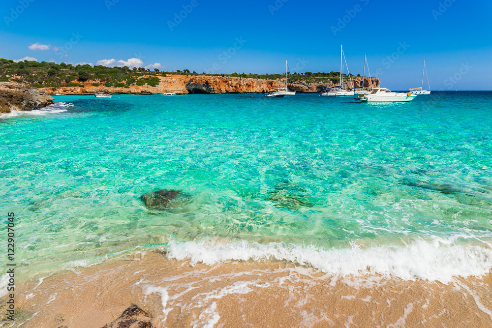 Mediterranean Sea Coast with turquoise water and boats at anchor