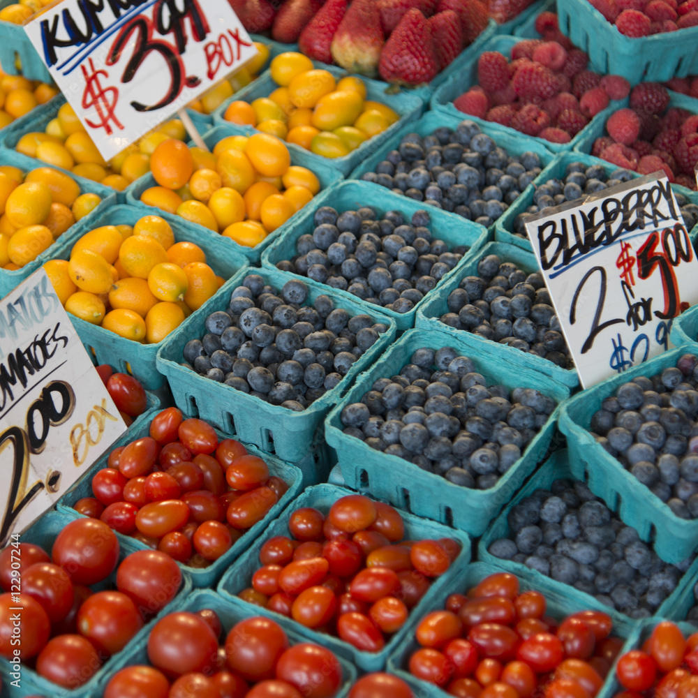 Fruits and vegetables for sale at a market stall, Pike Place Mar Fruits and vegetables for sale at a market stall, Pike Place Mar