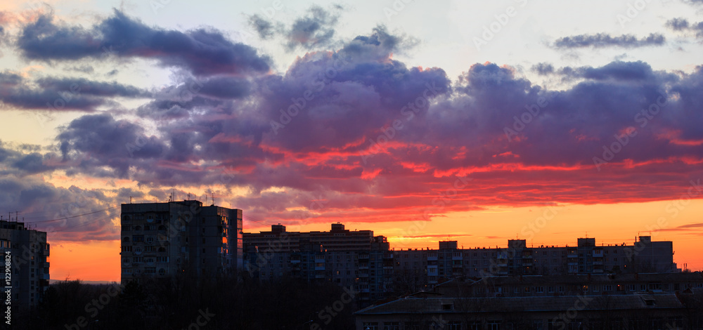 Fototapeta premium clouds over houses