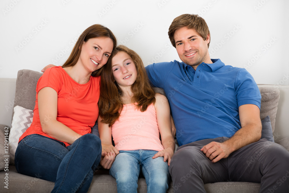 Family Sitting On Sofa Family Sitting On Sofa