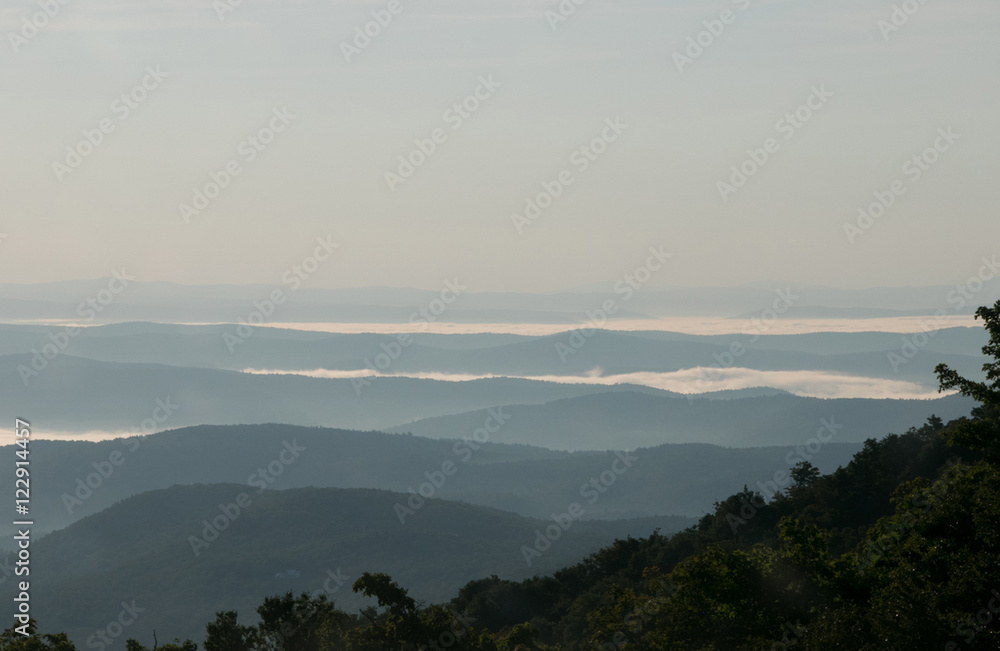 Fototapeta premium Fog Rising In The Mountains