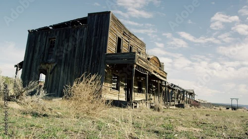 Old Ghost Town with Tumbleweed passing by.