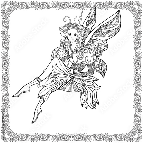 Fairy with butterfly wings on swing