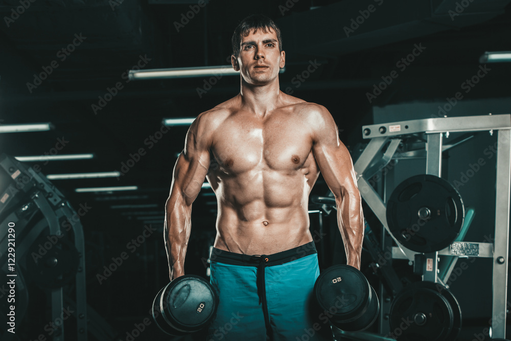 Muscle man doing bicep curls. Muscle man doing bicep curls.