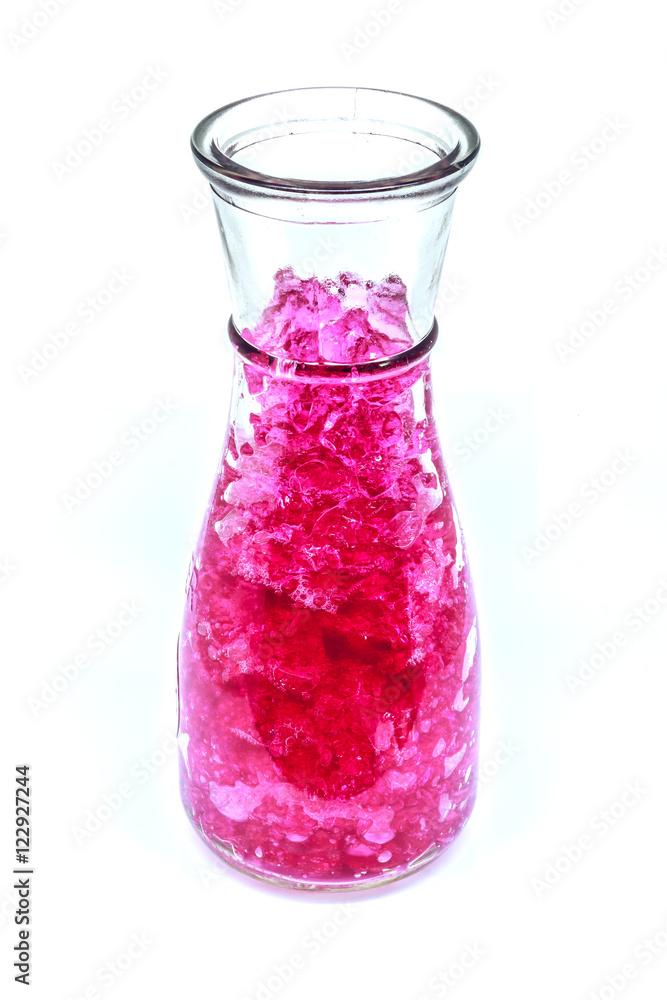 pink hydrogel in glass bottle isolated on white background