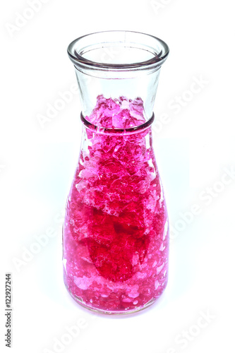 Obraz na płótnie pink hydrogel in glass bottle isolated on white background w salonie