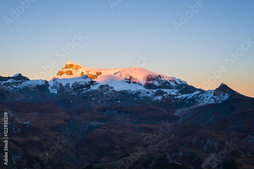 Sunset light over the scenics Monte Rosa glaciers and the Klein Matterhorn or Piccolo Cervino summit (3881 m), italian side, Valle d'Aosta.