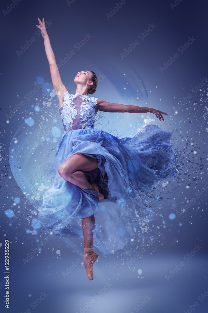Fototapeta premium The beautiful ballerina dancing in blue long dress 