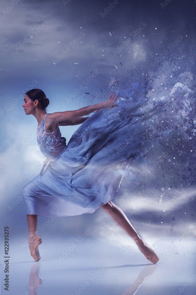 The beautiful ballerina dancing in blue long dress The beautiful ballerina dancing in blue long dress