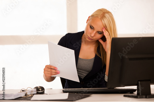 chrisis and depression - Businiss woman in office with bad busin photo