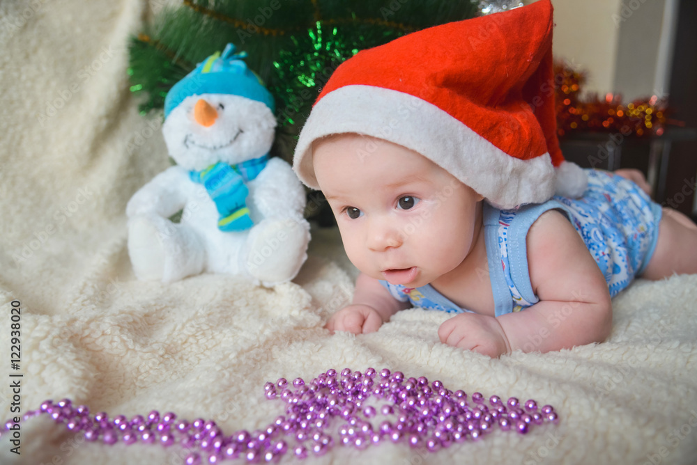 Christmas card with cute baby boy weared in santa red hat Christmas card with cute baby boy weared in santa red hat