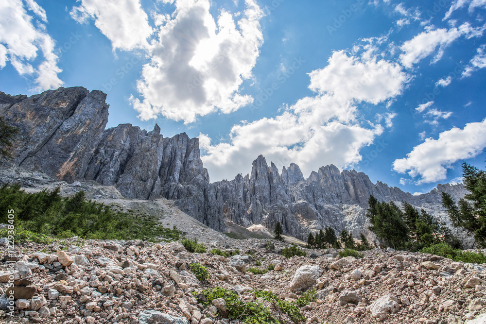 Beautiful mountains group called Latemar mountains ( Latemargruppe), under a cloudy blue sky, Trentino Alto adige, Italy