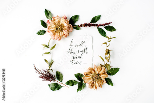 round frame wreath pattern with inspiration quote written in calligraphy style, beige dried peonies flowers, branches and leaves isolated on white background. flat lay, top view, mock up photo