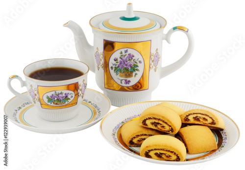 Tea cup, teapot and biscuits