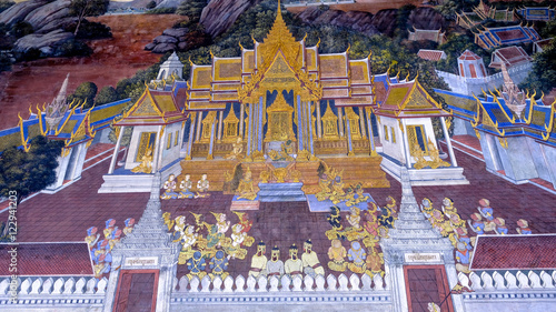 Photography Masterpiece of traditional Thai style painting art old (1931) of Ramayana story on the temple wall of famous Wat Phra Kaew in Bangkok, Thailand