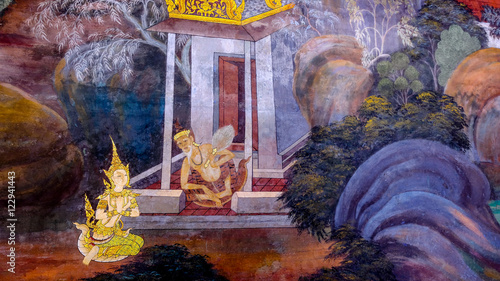 Photography Masterpiece of traditional Thai style painting art old (1931) of Ramayana story on the temple wall of famous Wat Phra Kaew in Bangkok, Thailand
