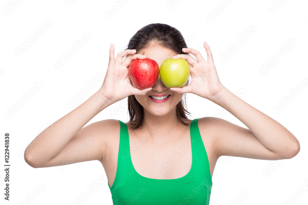 Attractive smiling young asian woman holding green apple isolate Attractive smiling young asian woman holding green apple isolate