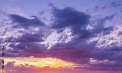 Beautiful sunset through the evening cloudy sky/Beautiful sunset through the evening cloudy sky © dianacrimea