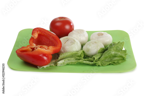 Raw vegetables on white background