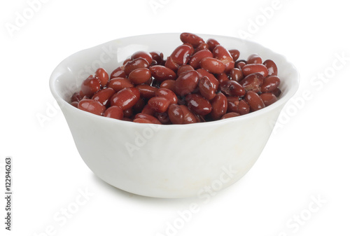 Red beans in a dish on a white background