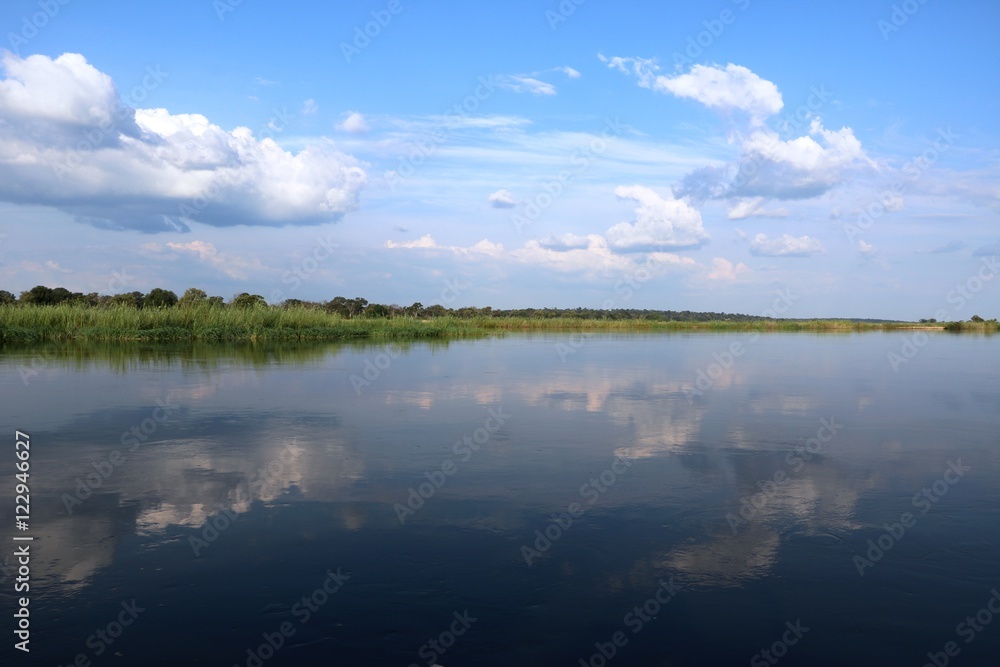 Clouds reflected in the Okavango, Caprivi strip of Namibia Africa