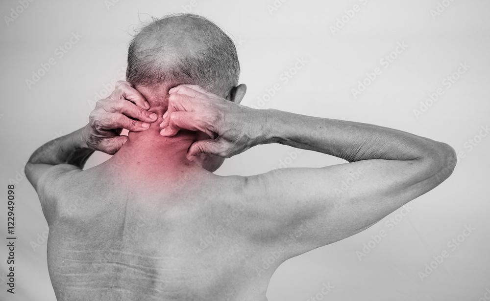 senior man hand holding he neck and massaging in pain area. Conc senior man hand holding he neck and massaging in pain area. Conc
