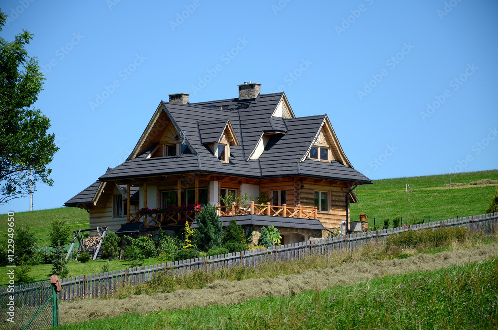 Wooden house in the mountains (The Tatras in Poland) - obrazy, fototapety, plakaty 