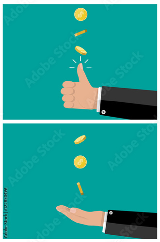 hand of businessman tossing and catches a coin