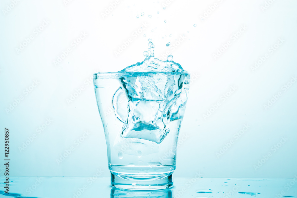 water splash in glasses isolated on white water splash in glasses isolated on white