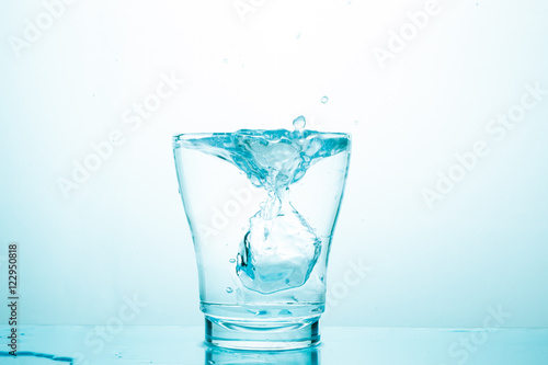 water splash in glasses isolated on white