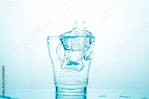 water splash in glasses isolated on white