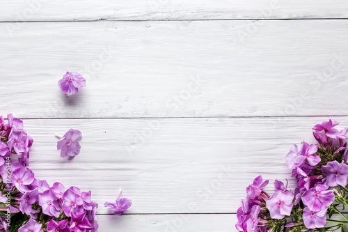 frame of flowers, background white boards